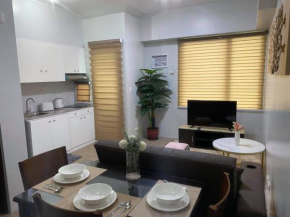 1 bedroom condo unit with balcony, netflix wifi and pool